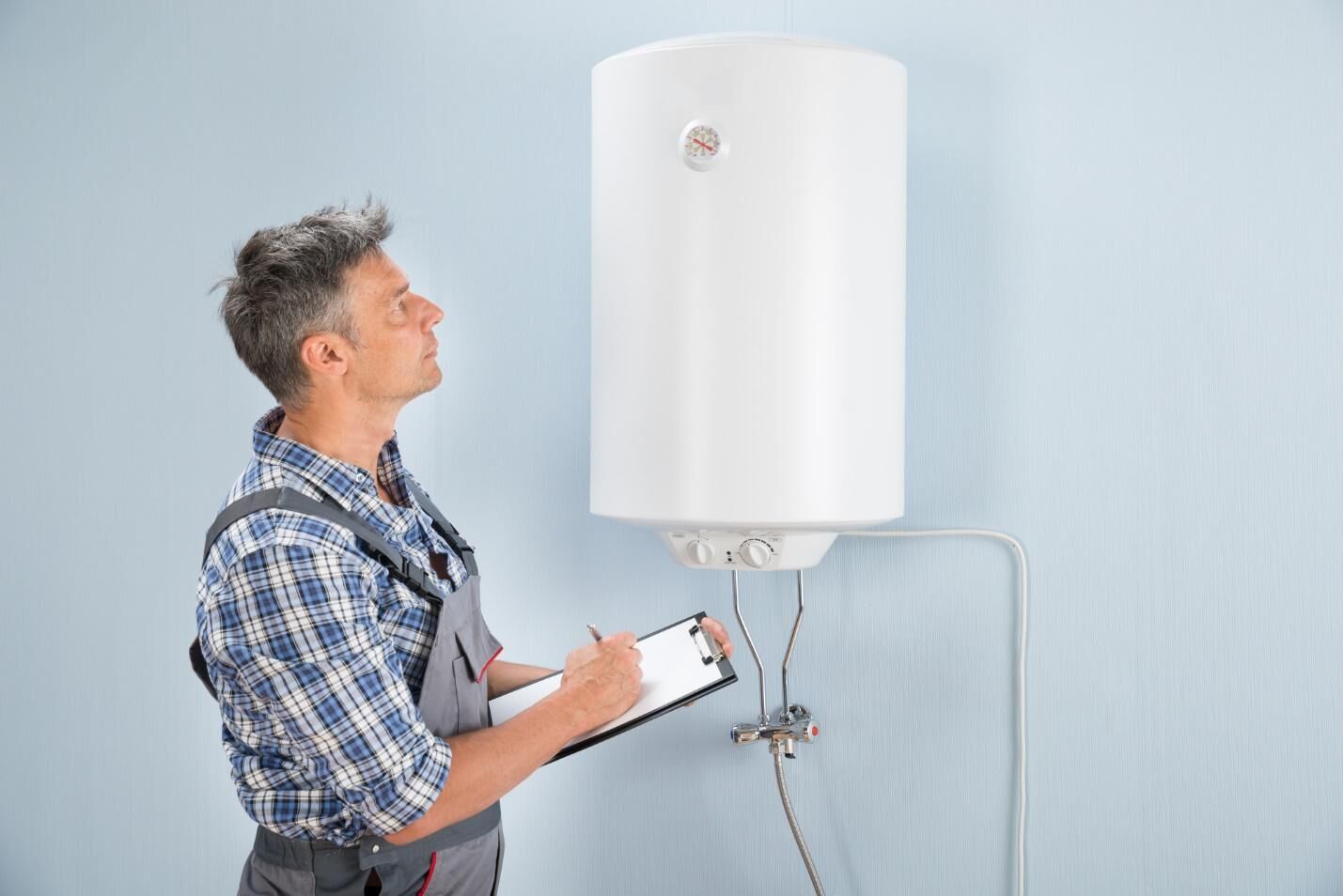 Perth plumber inspects home appliances